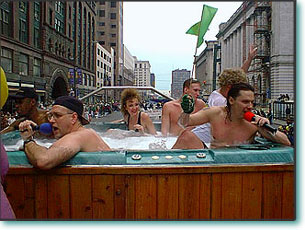 Parading in downtown Cleveland in a rental hot tub from Hot Tubs on Wheels!
